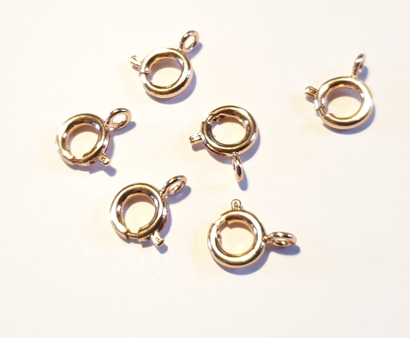 Fermoirs anneaux à ressort 7mm,- métal rosé
