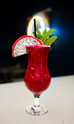 A close-up of a signature Limon Lounge cocktail