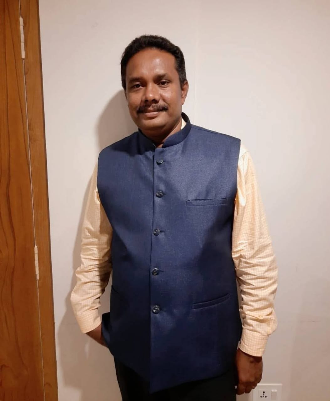 Er SAJI MATHEW