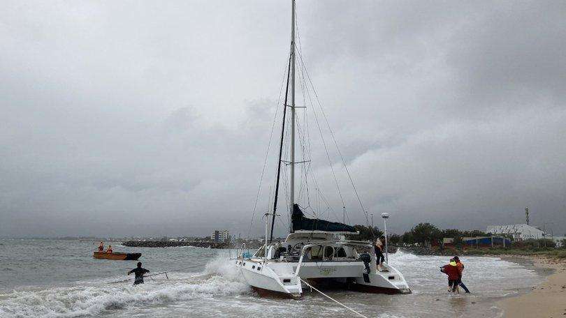 Emergency crews rescue two men after yacht strands off Quindalup coast