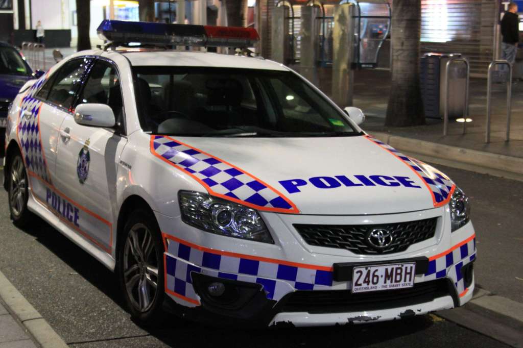 Man dies after being restrained by workers during disturbance at Brisbane bottle shop