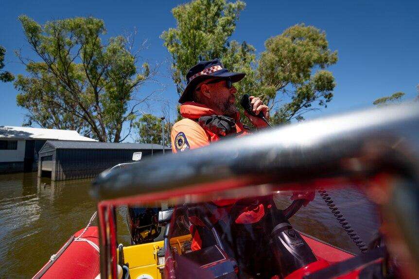 Man rescued from car rooftop as South Australia begins storm clean-up