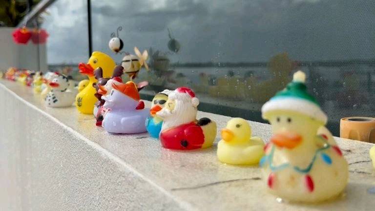 Gold Coast grandmother defies body corporate over popular rubber duck display