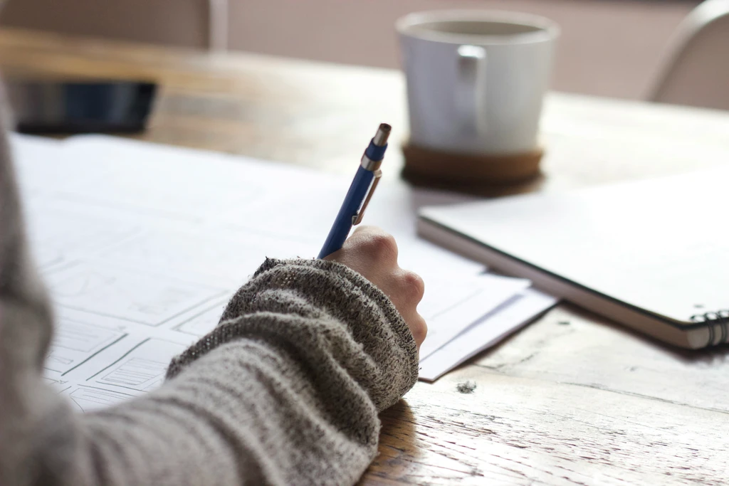 Person writing notes