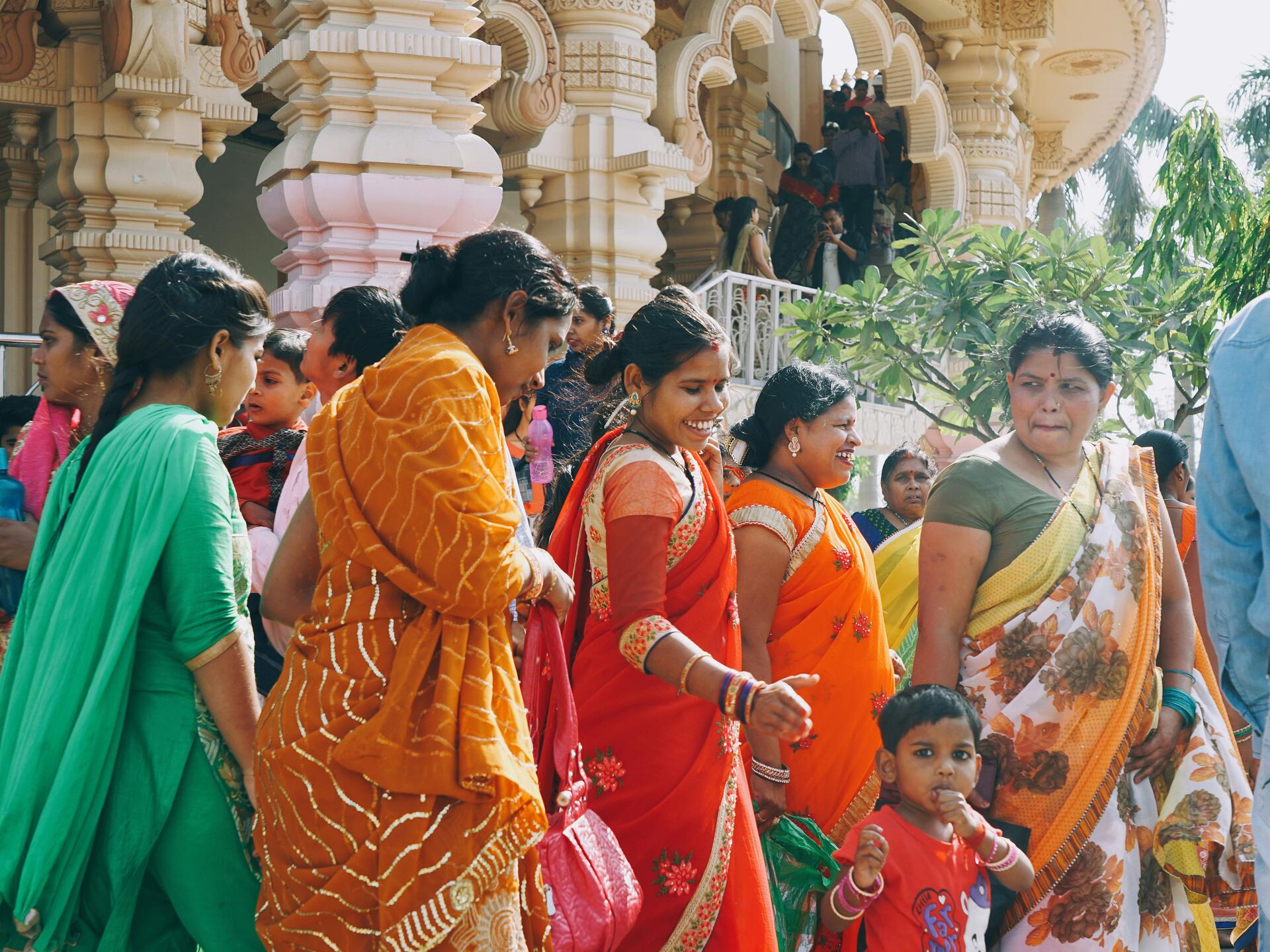 Women receiving cash transfers — policy shift recognising value of unpaid care work
