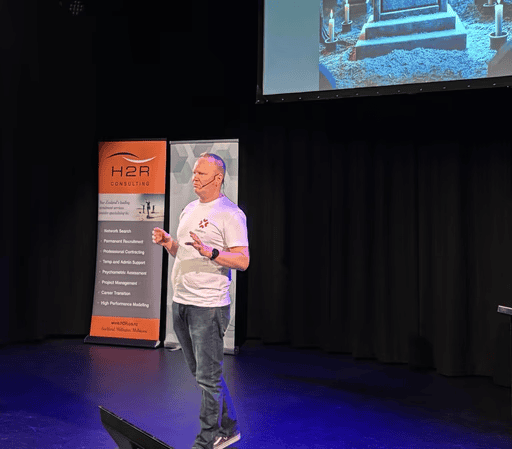 Jonathan Morgan presenting on stage