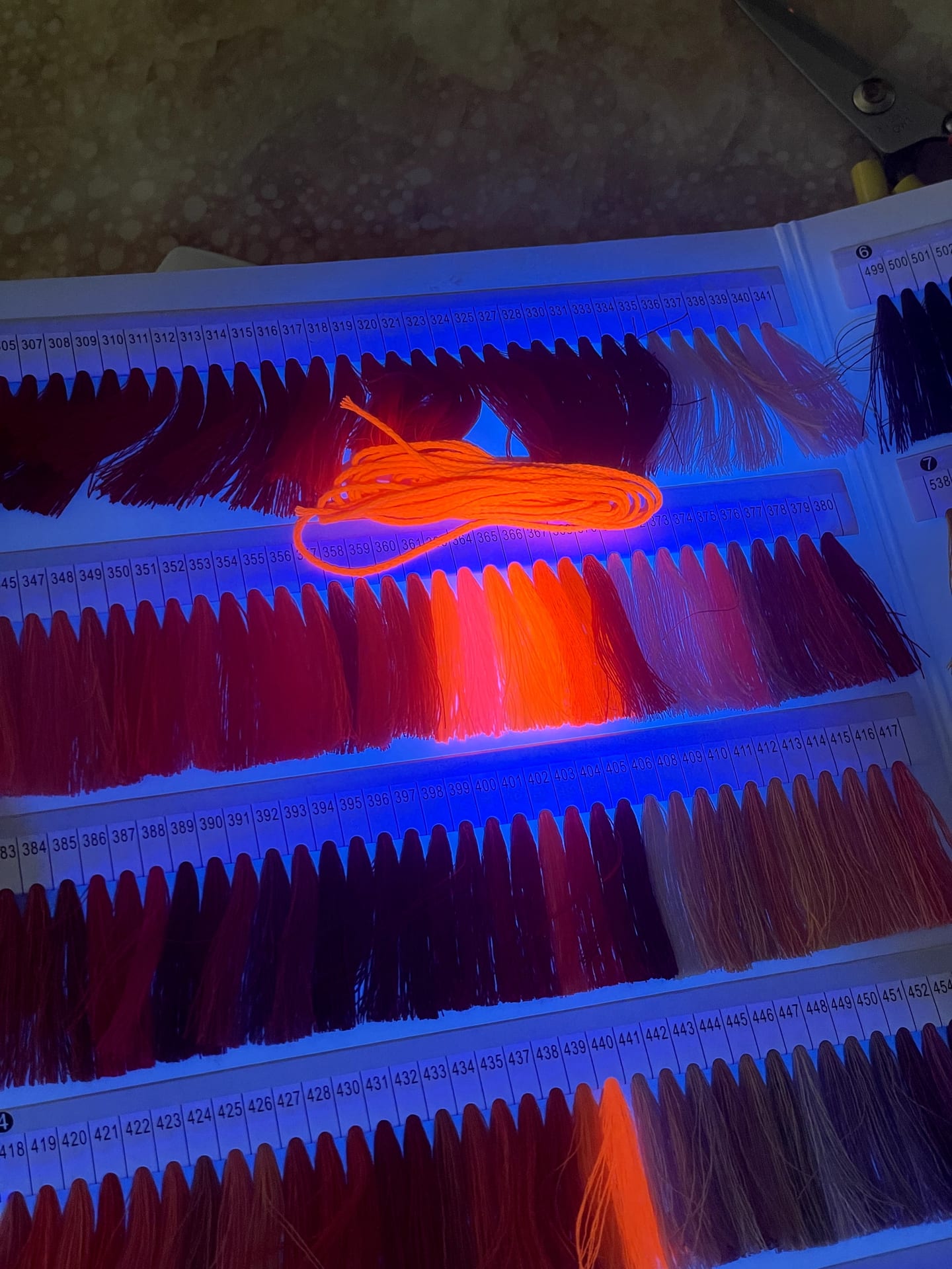 Spools of UV-reactive string