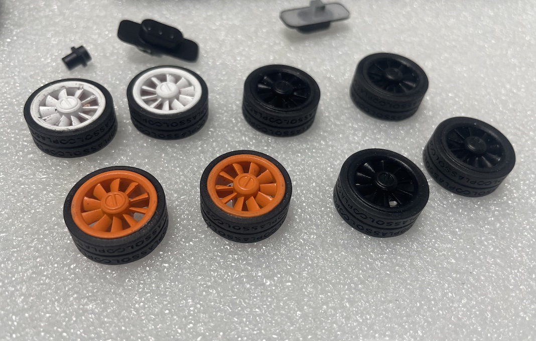 Dual-color injection molded drive wheel