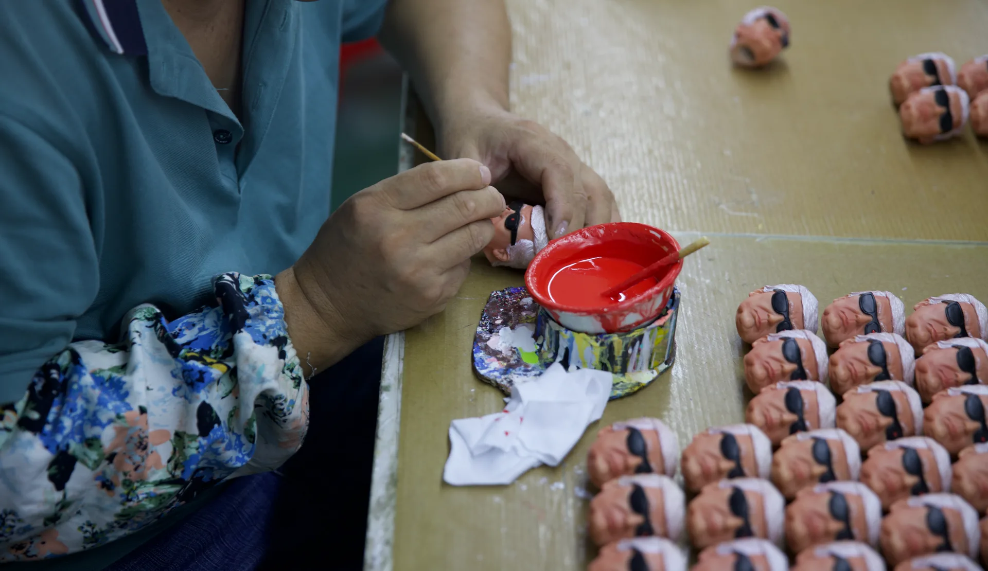 Hand-painting process across synchronized supply nodes