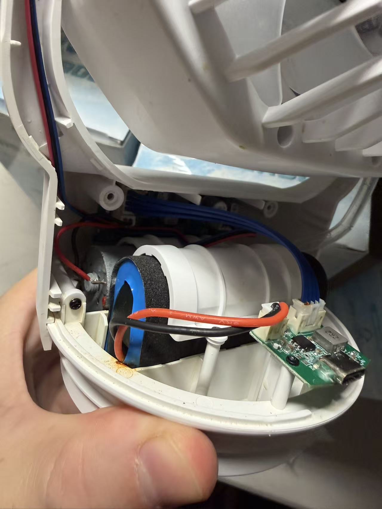 A product unit demonstrating a water leakage issue identified after the initial market release.