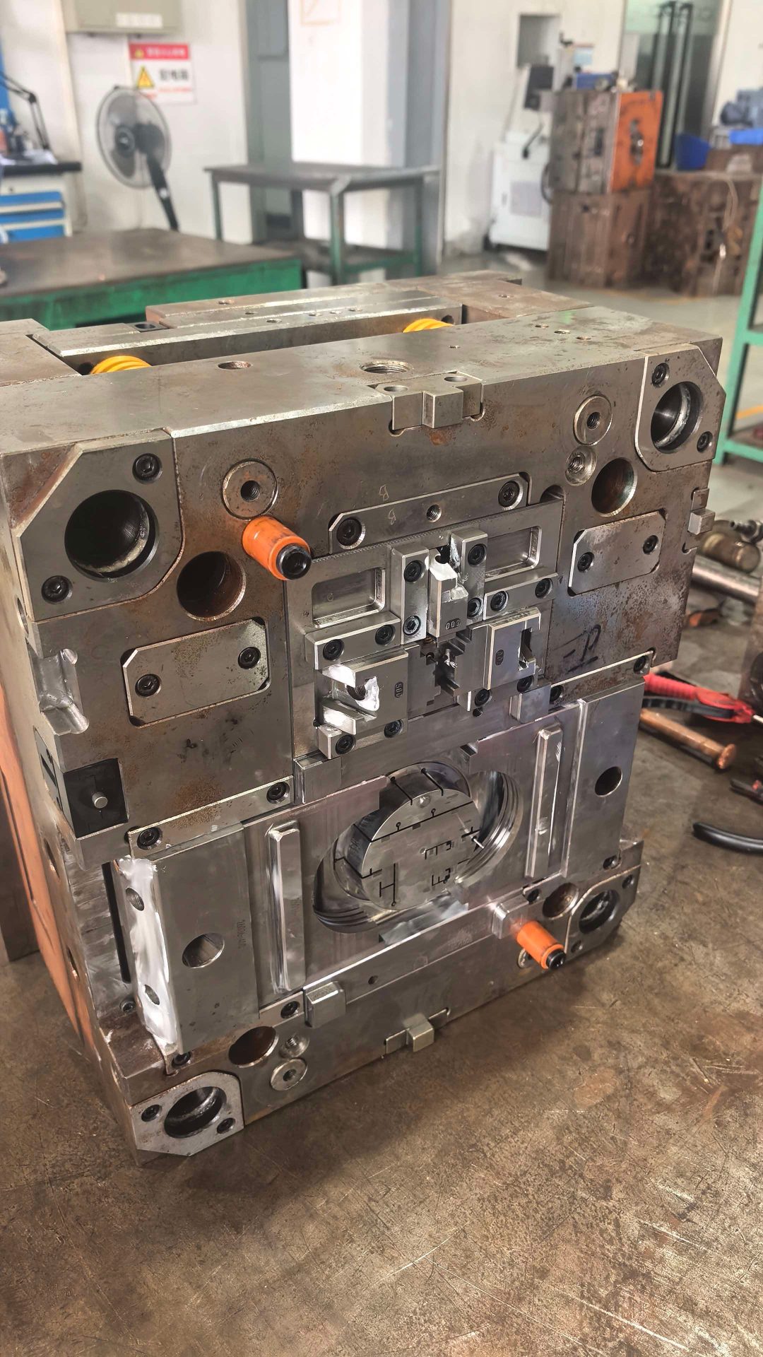 A modified mold designed to fit a larger replacement water pump.