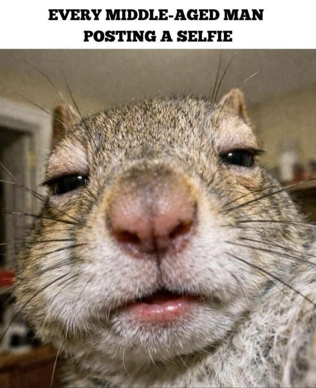 Middle aged man posting a selfie