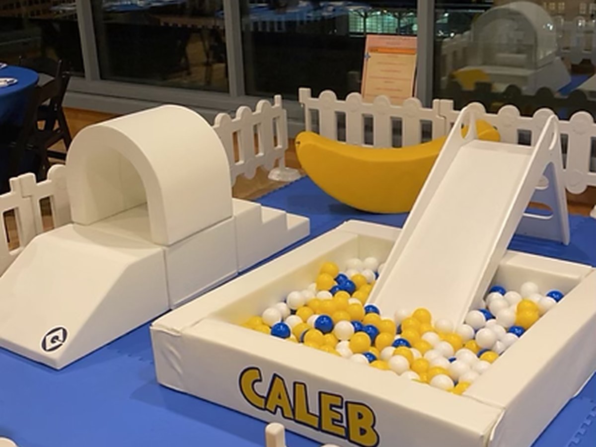 Indoor venue soft play setup in blue theme