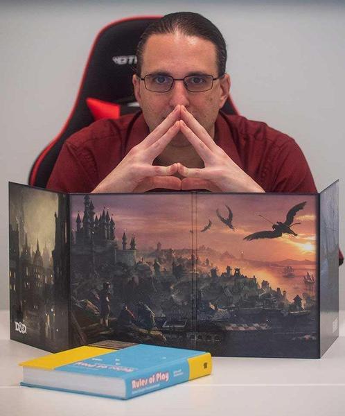Mark Mark maniacally staring at his players from behind a GM screen