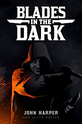 Cover of the Blades in the Dark core book. It's a darker cover, with a man, face half in shadow, coming at the camera with a pair of knives. His hood is pulled up over his head, and there are what appears to be burning embers off to his side, causing it to glow orange.