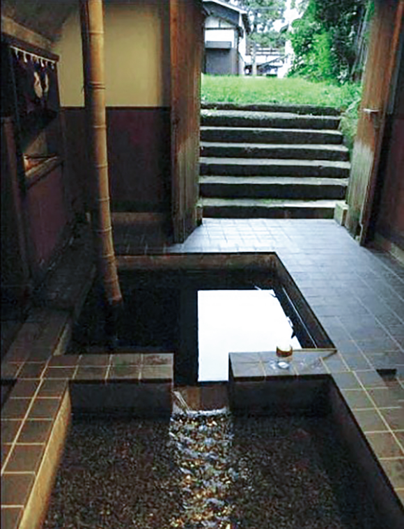 The brewery's spring water source (Biwanuma Kansen) used for brewing