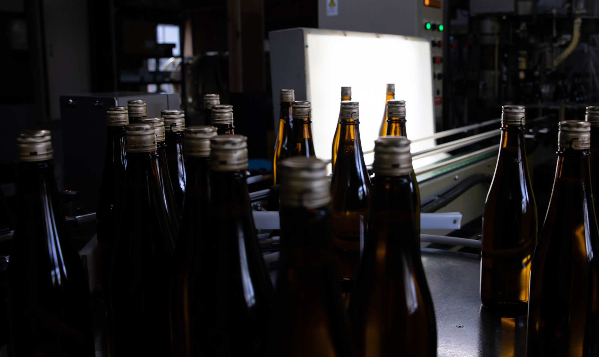 Bottling line with capped sake bottles