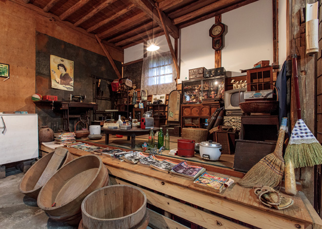 Interior of the retail shop displaying vintage brewing tools and memorabilia.