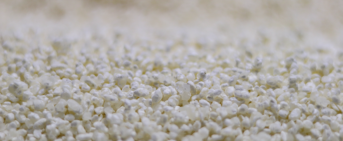 Close-up of steamed rice used in the brewing process.