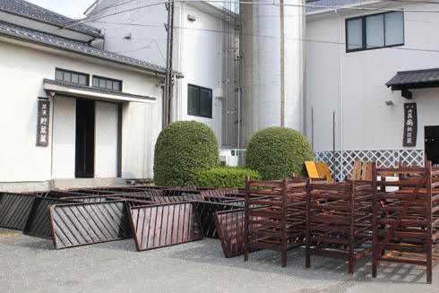 Koji trays washed and set out to dry outside the brewery building