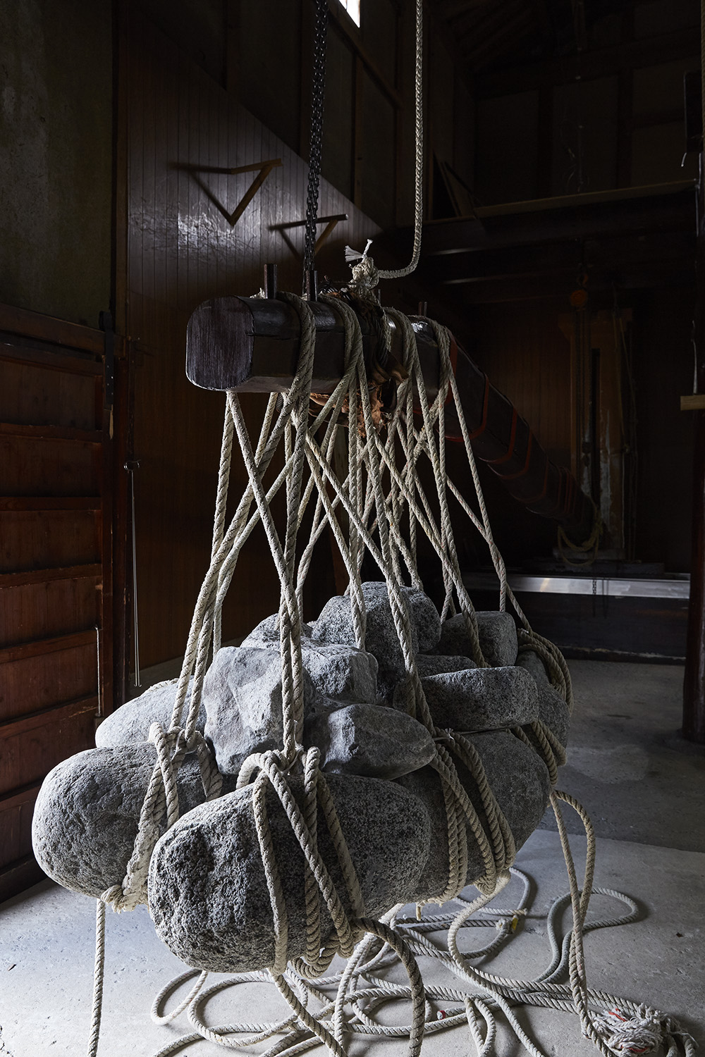 Stones used in the traditional hanegi-shibori lever-press method to gently press the sake.