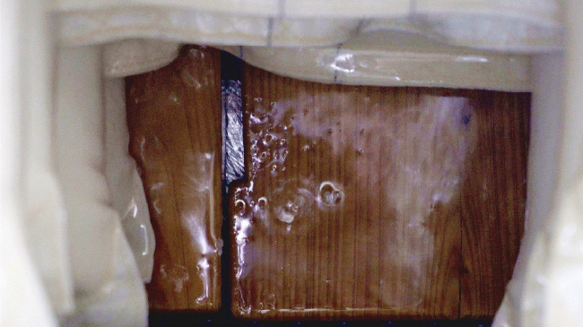 Close-up of the traditional wooden kibune press used for all of Ikezuki's sake for 120 years.