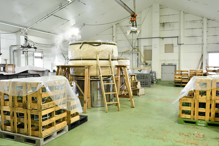 Rice steaming vessel (koshiki) set up in the brewery workshop.