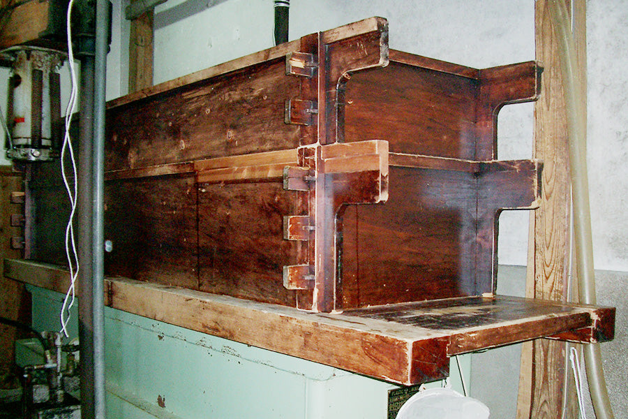 Traditional wooden fune press box used for whole-batch pressing