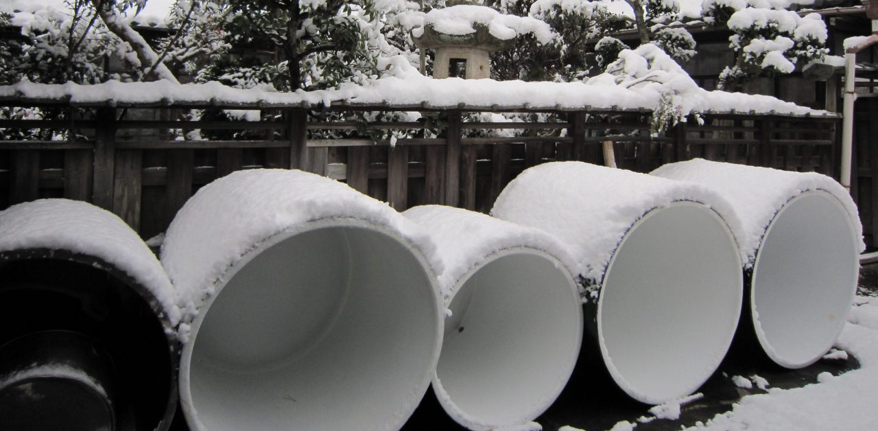 Small tanks in the snow, brewery grounds