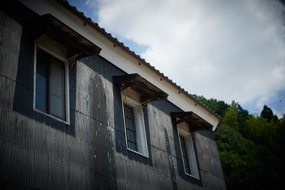 Exterior wall and windows of the historic kura, from the gallery's nostalgic Meiji-Taisho-Showa era photo set