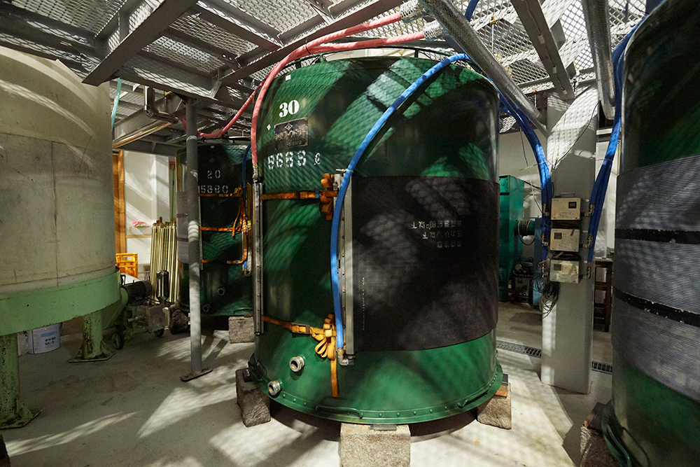 Modern fermentation tanks inside the Ginjozo brewing facility