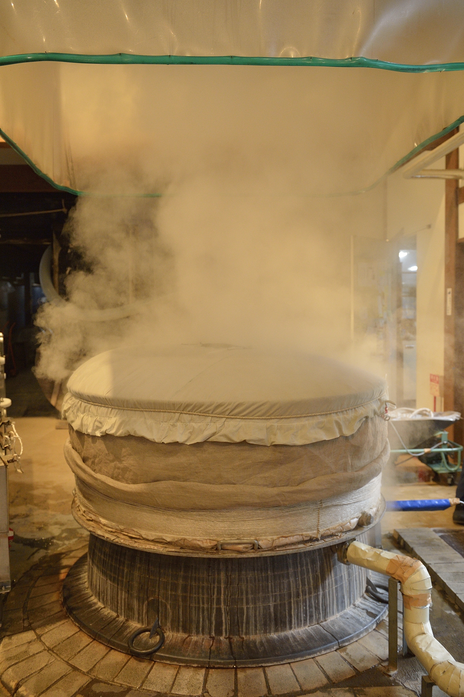 Steam rising from the rice-steaming vessel (koshiki) during production