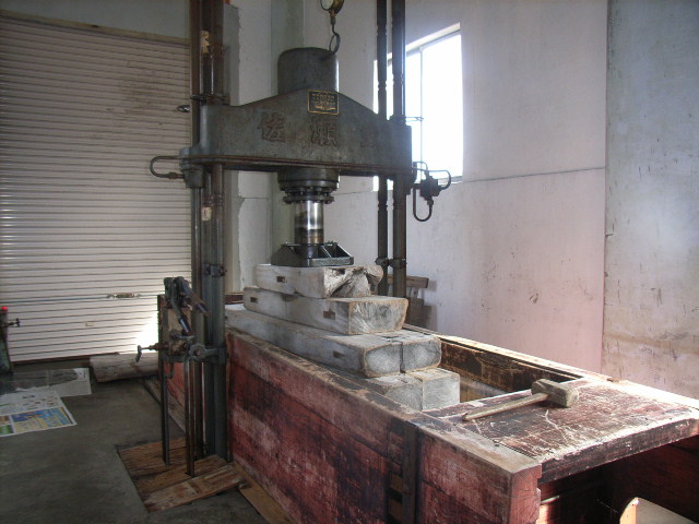The brewery's traditional wooden kibune press used to press the sake.