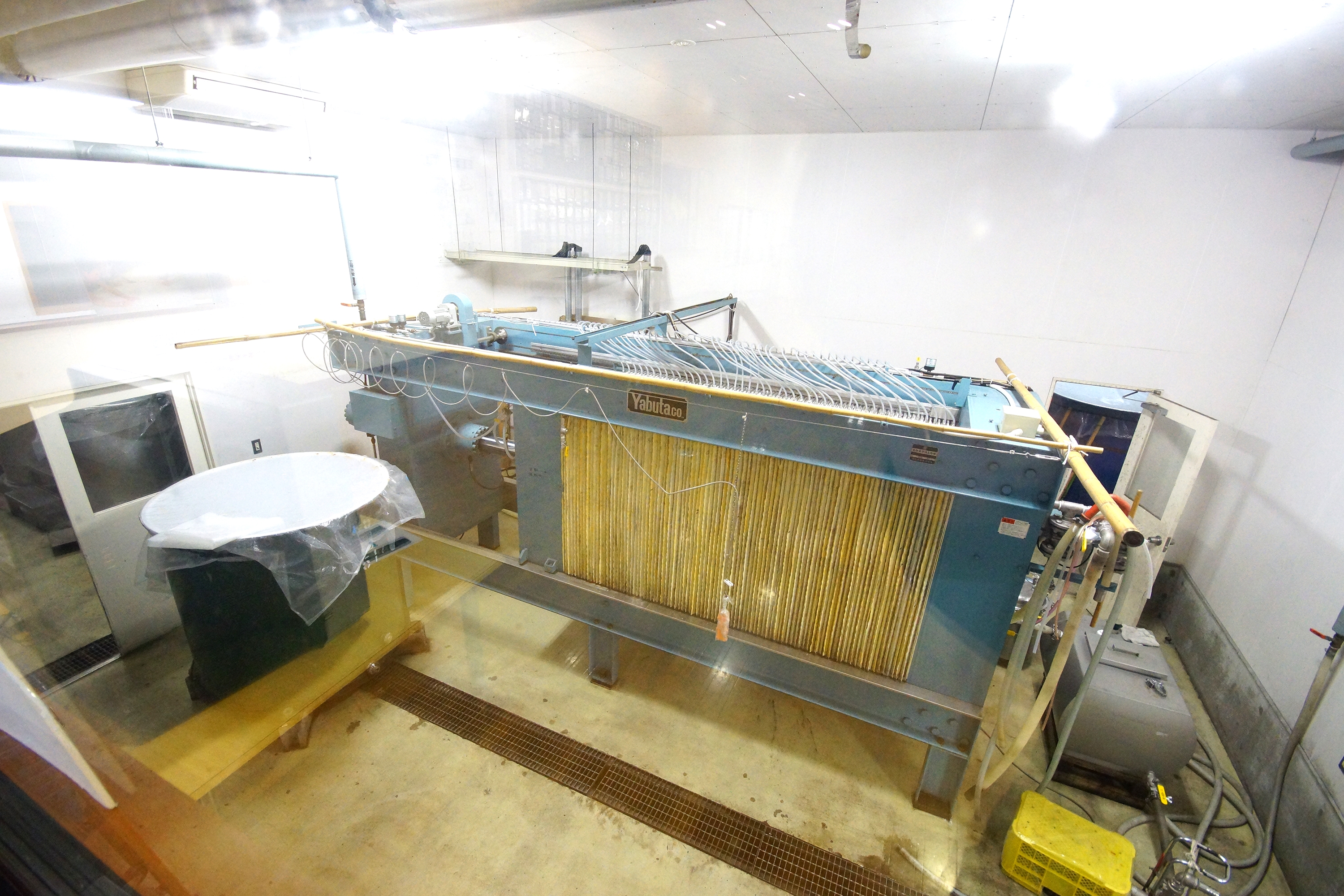 Moromi filter press (assaku) equipment in the factory area