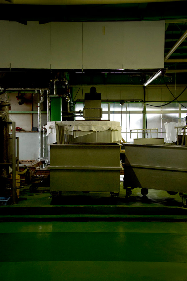 Brewing tanks and equipment inside the kura