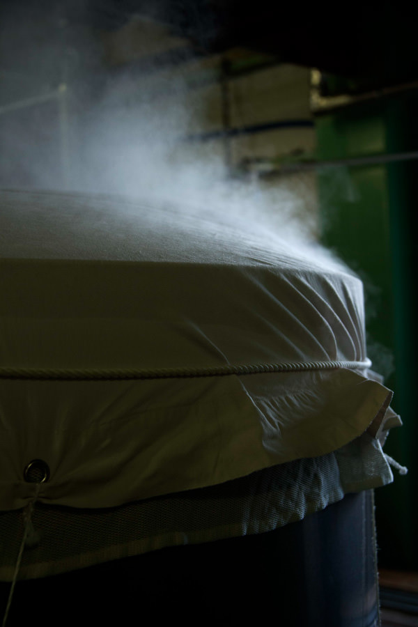 Steam rising from the rice steamer (koshiki) during brewing