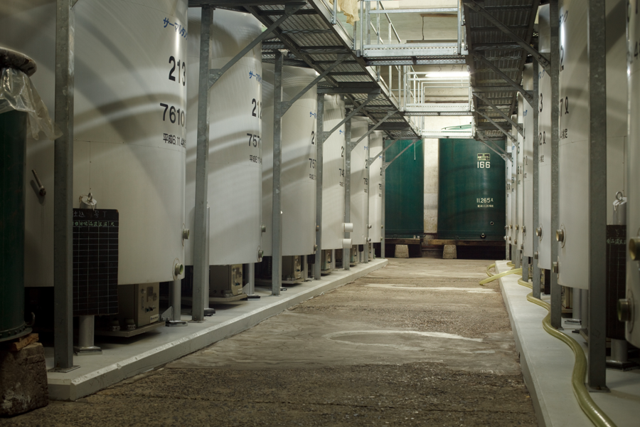 Rows of storage tanks in the brewery's tank hall