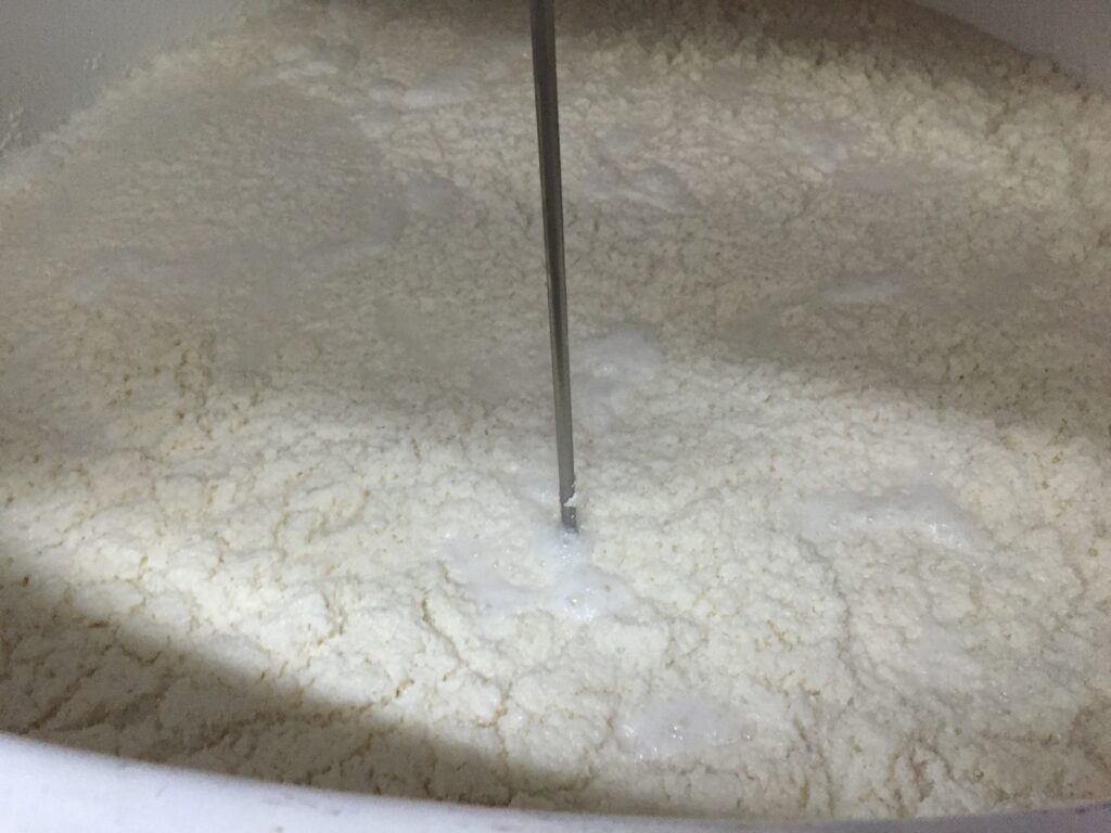 Mash tank being stirred during brewing