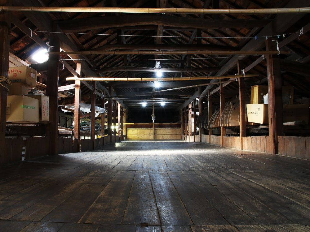 Interior of the storage loft at Takeoka-kura brewery.