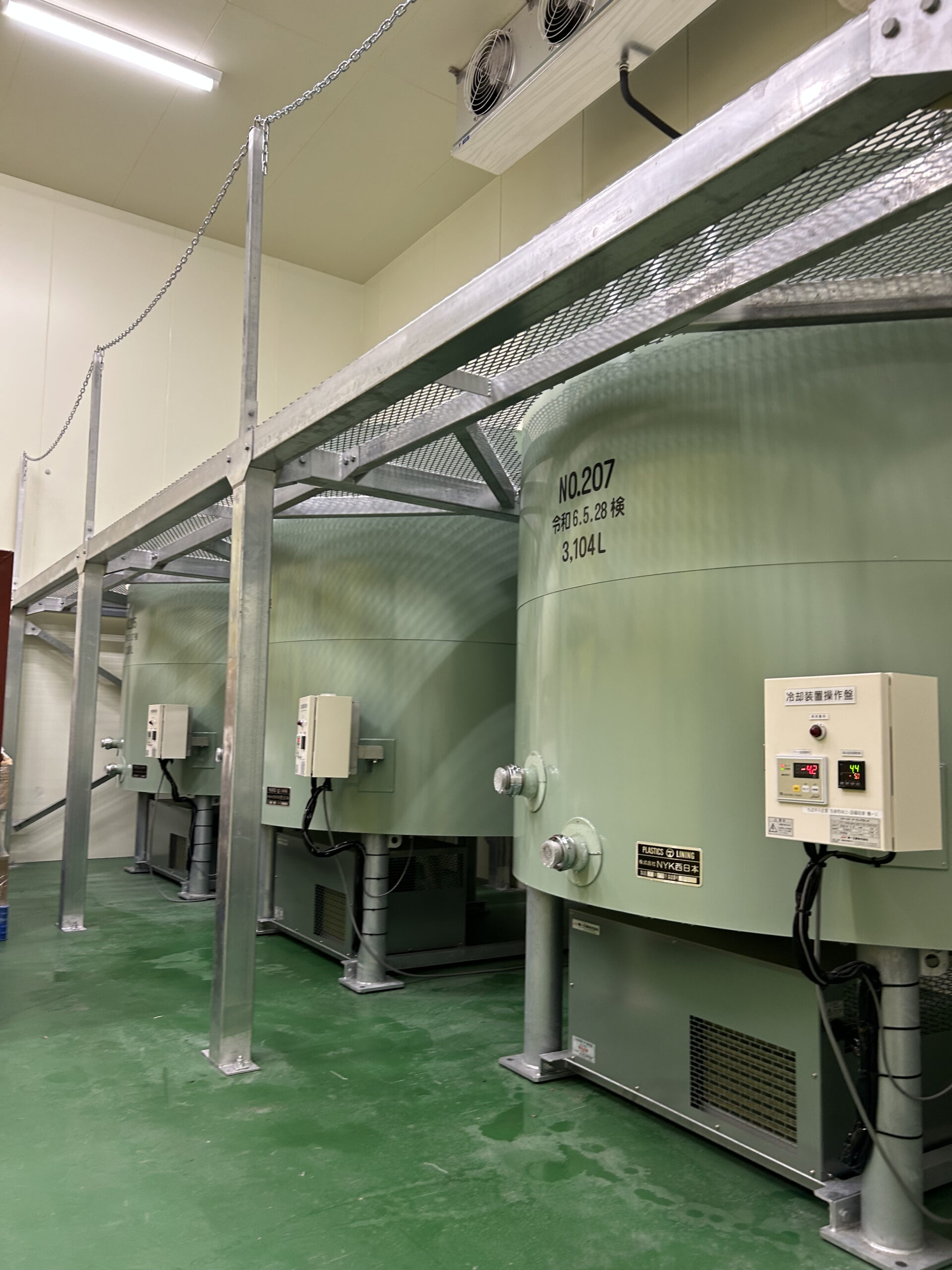 Sake storage tanks in the cooling room