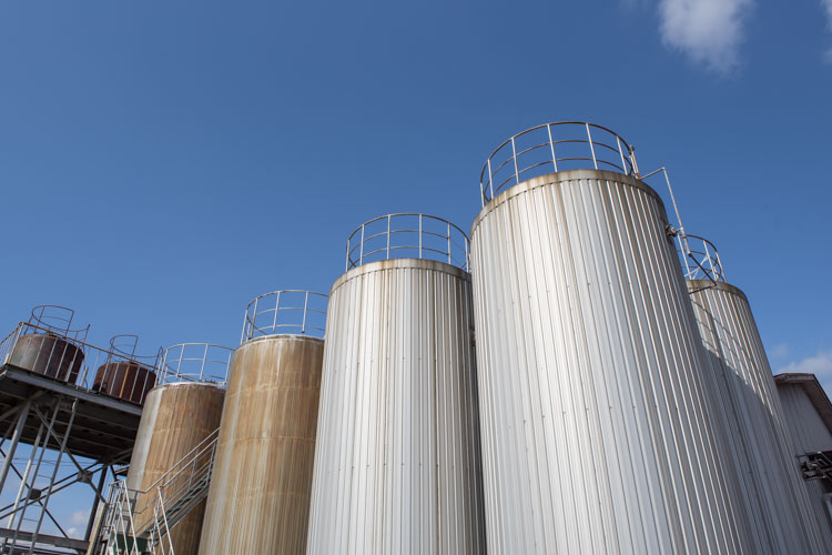 Outdoor storage tanks at the Seitoku Meijo brewery