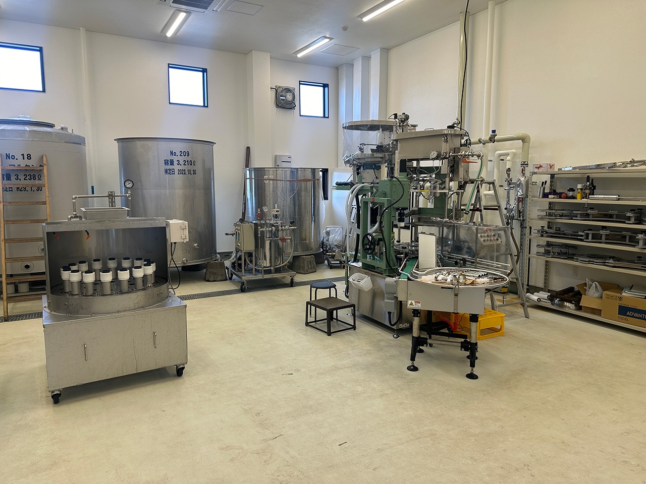 Fermentation tanks and bottling line inside the brewery