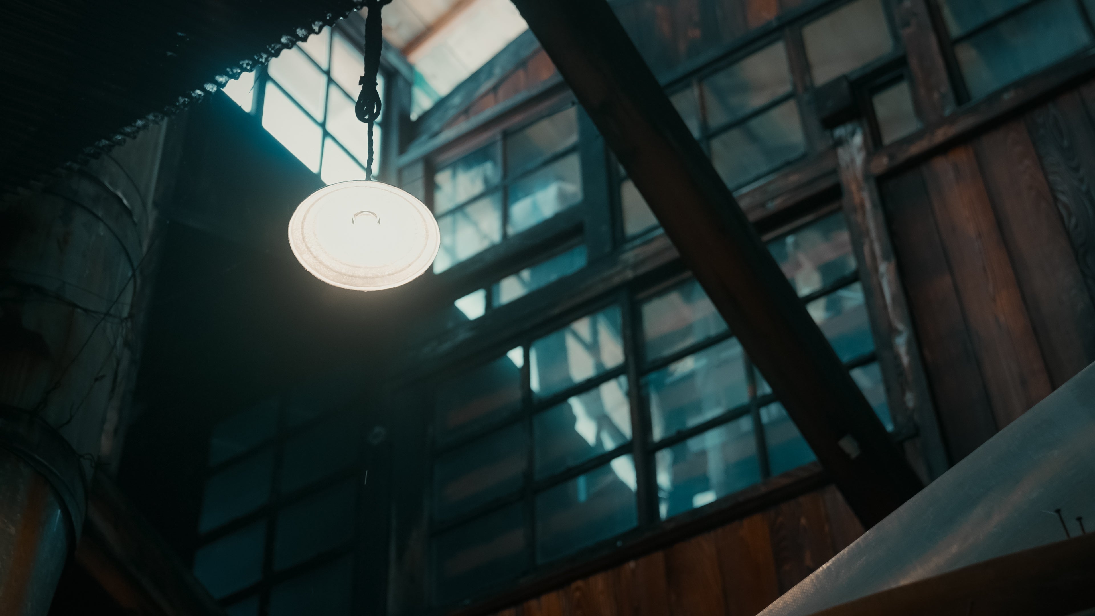 Inside the brewery: wooden beams and windows