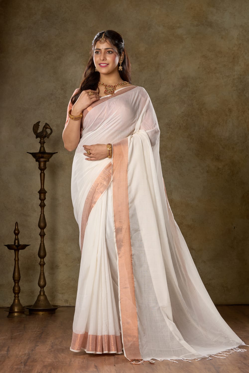 Rich Ivory Mul Cotton Saree With Copper Zari Border | By Nikunj Khatri 2025 – LuckShri: Premium Mul Cotton Saree by Nikunj Khatri