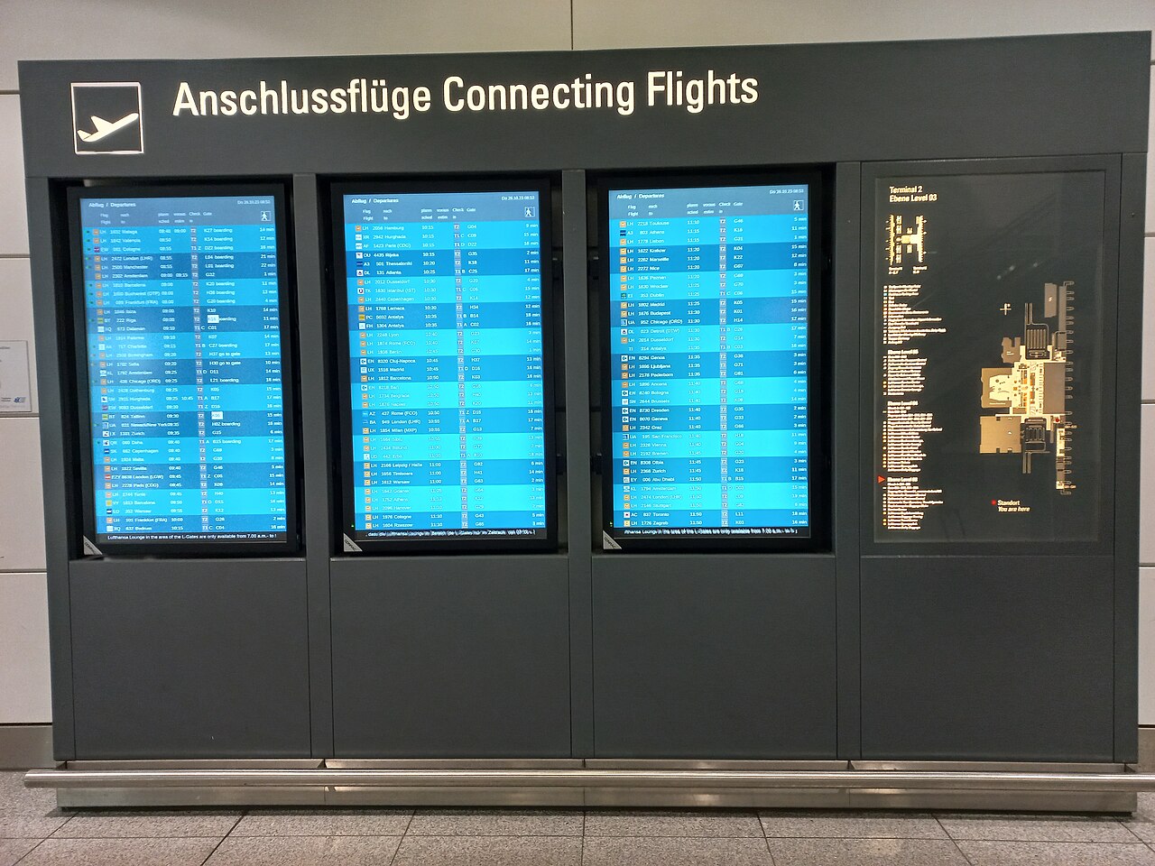 Airport monitors showing connecting flights at Munich Airport