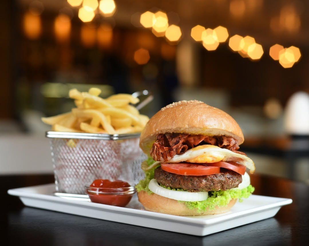 Texas Burger! only @ 35,000UGX #CaramelTreats #Mou