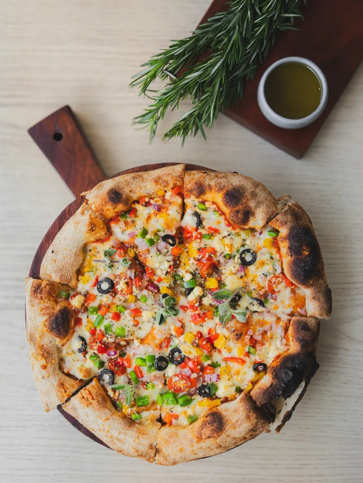 Wood-fired, perfectly crisp, and worth every bite.