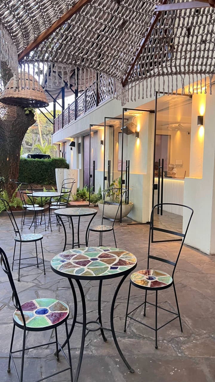 Sip handcrafted cocktails at the outdoor bar, indu