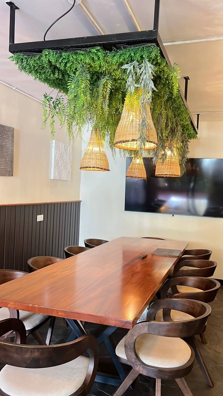 Sip handcrafted cocktails at the outdoor bar, indu
