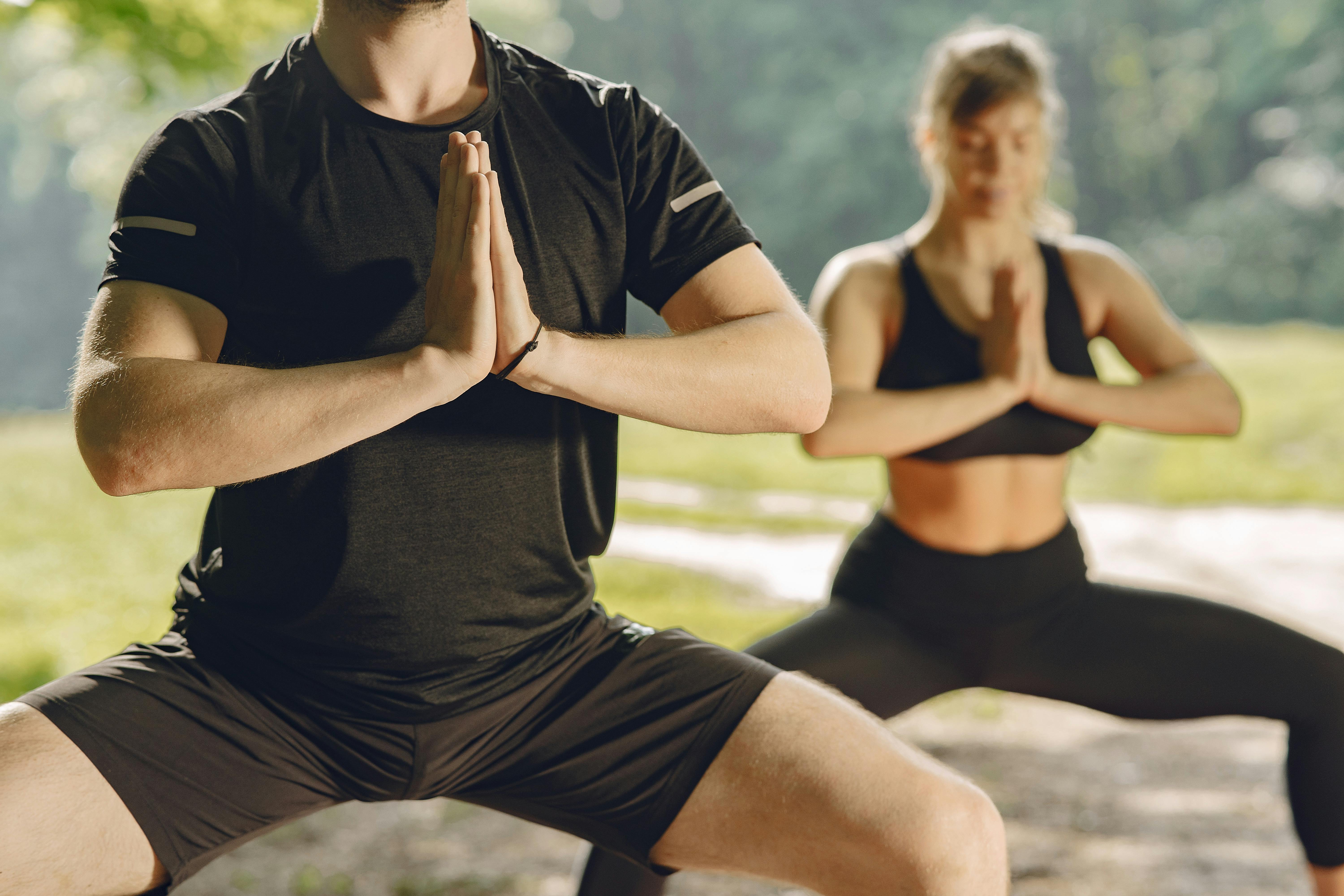 a couple of women doing yoga